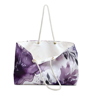 Purple and white floral weekender bag with cotton rope handles and spacious interior