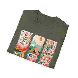 Unisex softstyle green t-shirt with colorful camping adventure graphic featuring flowers, mountains, tent, and sun