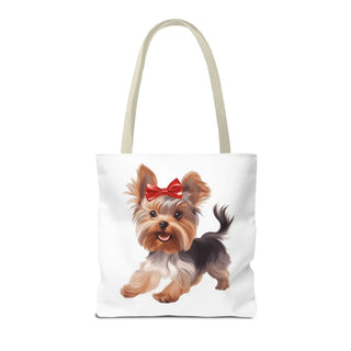 Yorkie puppy tote bag with hand-painted style Yorkshire Terrier and red bow on white background, available in multiple sizes with durable polyester and reinforced handles.
