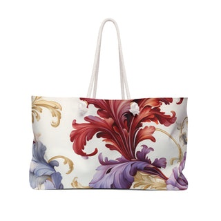 Elegant floral weekender bag with cream background and red, purple, gold leaf patterns, cotton rope handles, large and stylish travel tote