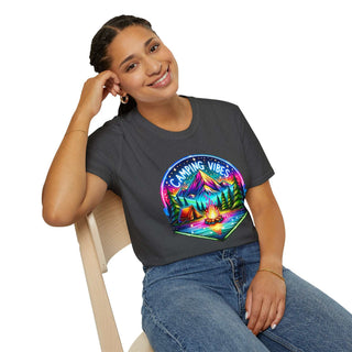 Woman wearing a black unisex softstyle t-shirt with colorful Camping Vibes graphic of mountains, tents, and campfire