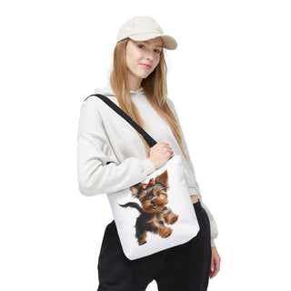 Yorkie puppy tote bag with hand-painted style Yorkshire Terrier and red bow on white background