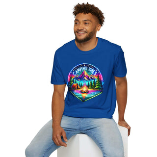 Man wearing a blue Camping Vibes unisex softstyle t-shirt with a colorful campfire and mountain design