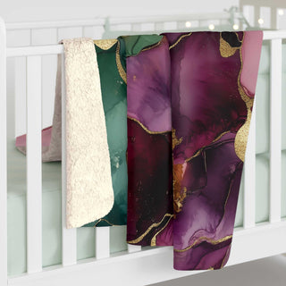 Luxurious green and plum sherpa blanket with jewel-toned floral print and plush fleece backing