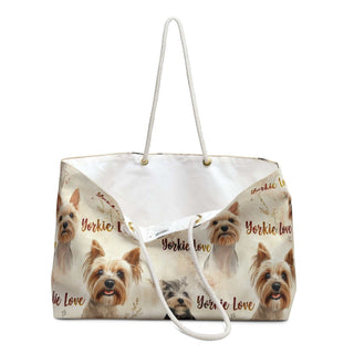 Cream canvas Yorkie Love weekender bag with watercolor Yorkie portraits and rope handles.