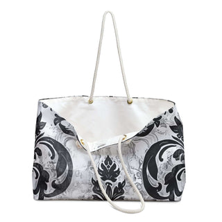 Chic Vintage Weekender Bag with black and white pattern, cream rope handles, and spacious 24x13 inch size for stylish travel.