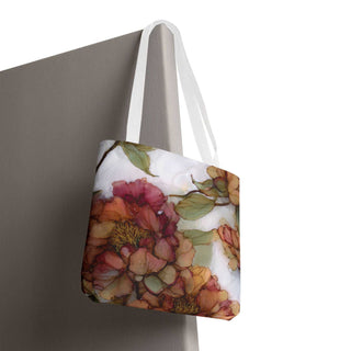 Vintage Peony Tote Bag with watercolor-style floral design and white handles hanging against a gray background