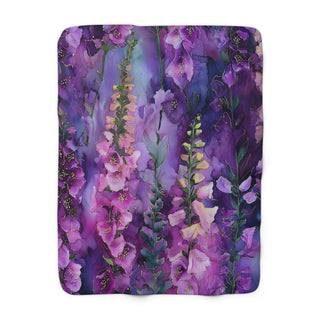 Violet Foxglove Sherpa fleece blanket with floral design and soft hemmed edges, 50x60 inches.