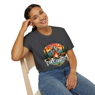 Woman wearing a dark gray unisex t-shirt with vibrant campfire design and "Life is Better by the Campfire" text, paired with blue jeans.
