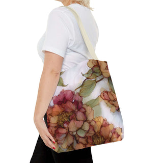 Vintage Peony Tote Bag with watercolor floral print in rose, apricot, and olive tones on polyester fabric with beige handles.