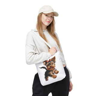 Yorkie puppy tote bag with hand-painted Yorkshire Terrier design and red bow on white background