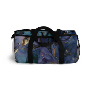 Elegant floral duffel bag with black straps and blue-purple floral pattern for travel and fitness