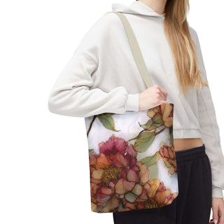 woman carrying vintage peony tote bag with watercolor floral design and beige handles