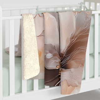 Neutral floral sherpa blanket with watercolor blooms and plush velvety backing in warm neutral tones