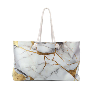 Marble Chic Weekender Bag with gold accents and spacious interior for stylish travel