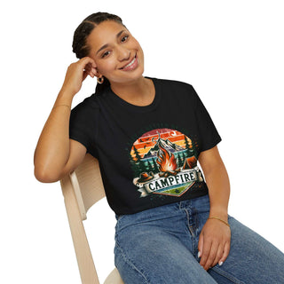 Smiling woman wearing black Camping Adventure Unisex T-Shirt with vibrant campfire graphic sitting on chair