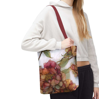 woman holding vintage peony tote bag with watercolor floral design and burgundy handle