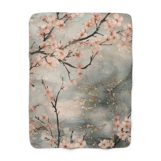 Blush cherry blossom sherpa blanket with velvety soft back and pale floral print, 50x60 inches