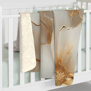 Neutral gold floral sherpa blanket with plush fleece and velvety backing, 50x60 inches, soft muted florals and gold accents.