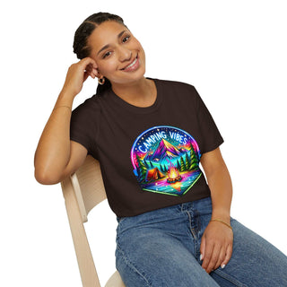 Woman wearing black Camping Vibes Unisex Softstyle T-shirt with colorful camping scene graphic.