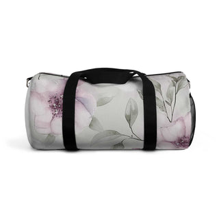 Small floral pattern duffel bag with black handles and pastel flower design